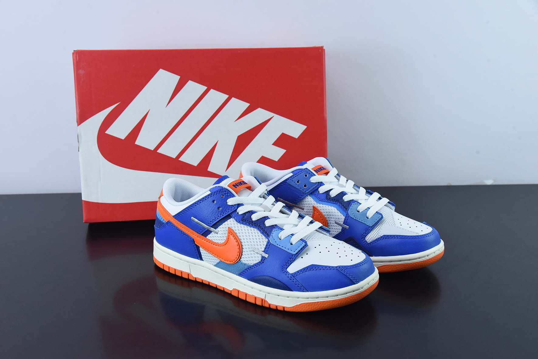 耐克Nike SB Dunk Scrap LowKnicks拼接蓝橙白缝合怪扣篮系列低帮经典百搭休闲运动板鞋纯原版本 货号：DM0128-100