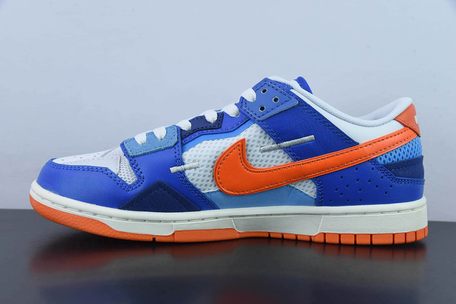 耐克Nike SB Dunk Scrap LowKnicks拼接蓝橙白缝合怪扣篮系列低帮经典百搭休闲运动板鞋纯原版本 货号：DM0128-100